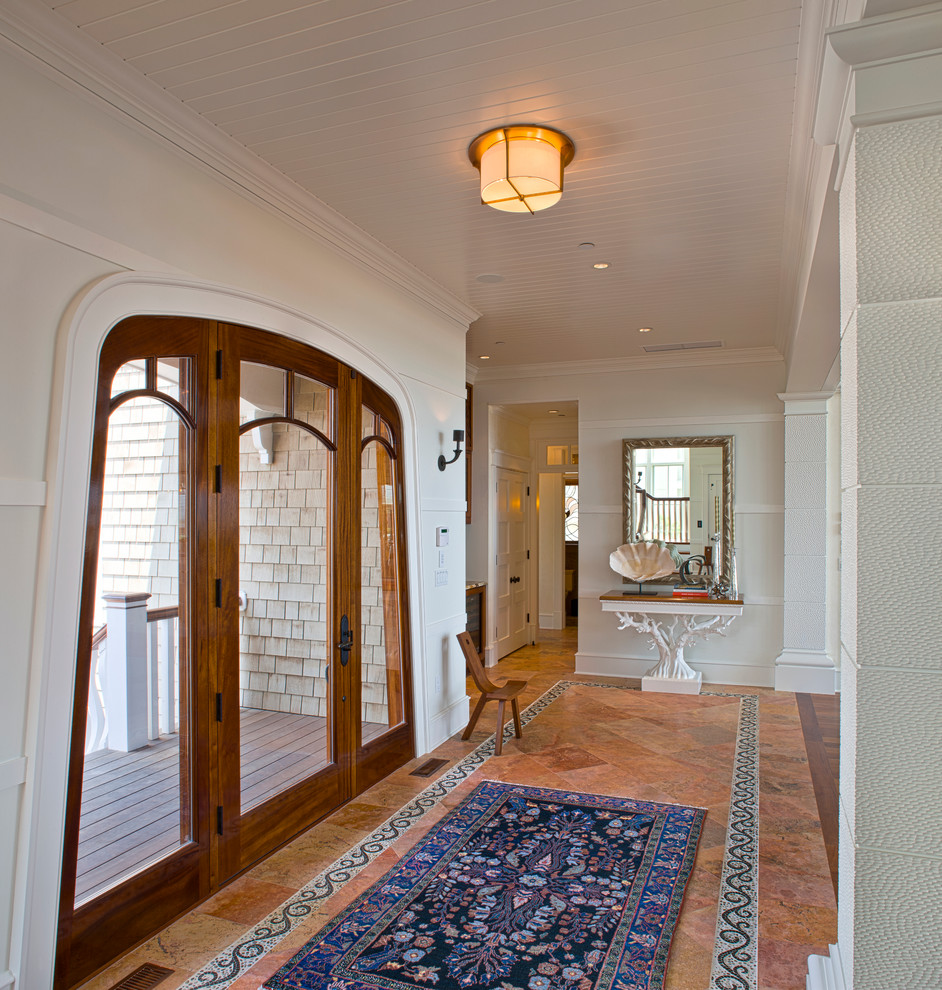 Design ideas for a coastal hallway in DC Metro with a single front door and a glass front door.