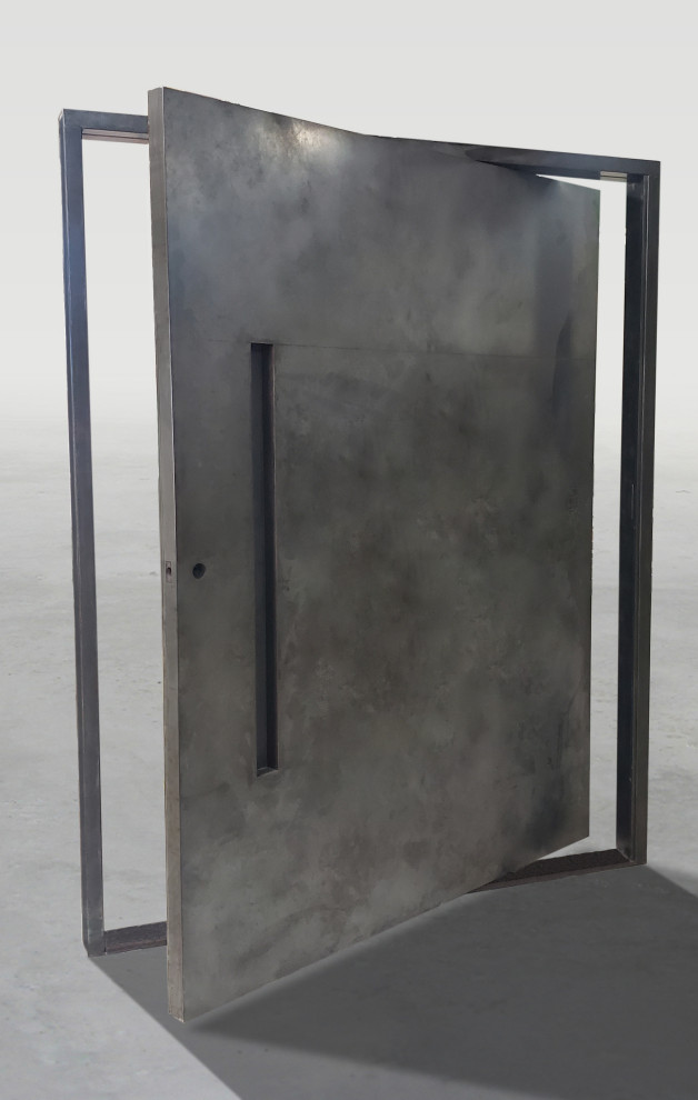 Ispirazione per una porta d'ingresso industriale con una porta a pivot e una porta in metallo