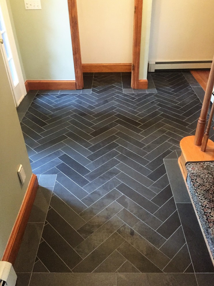 Mid-sized transitional slate floor and black floor entryway photo in Boston