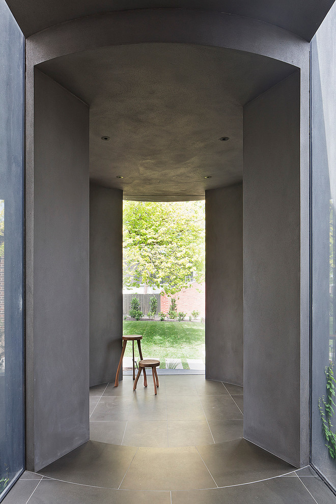 Modern entrance in Melbourne with grey walls.
