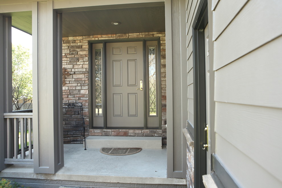 Mid-sized trendy concrete floor single front door photo in Other