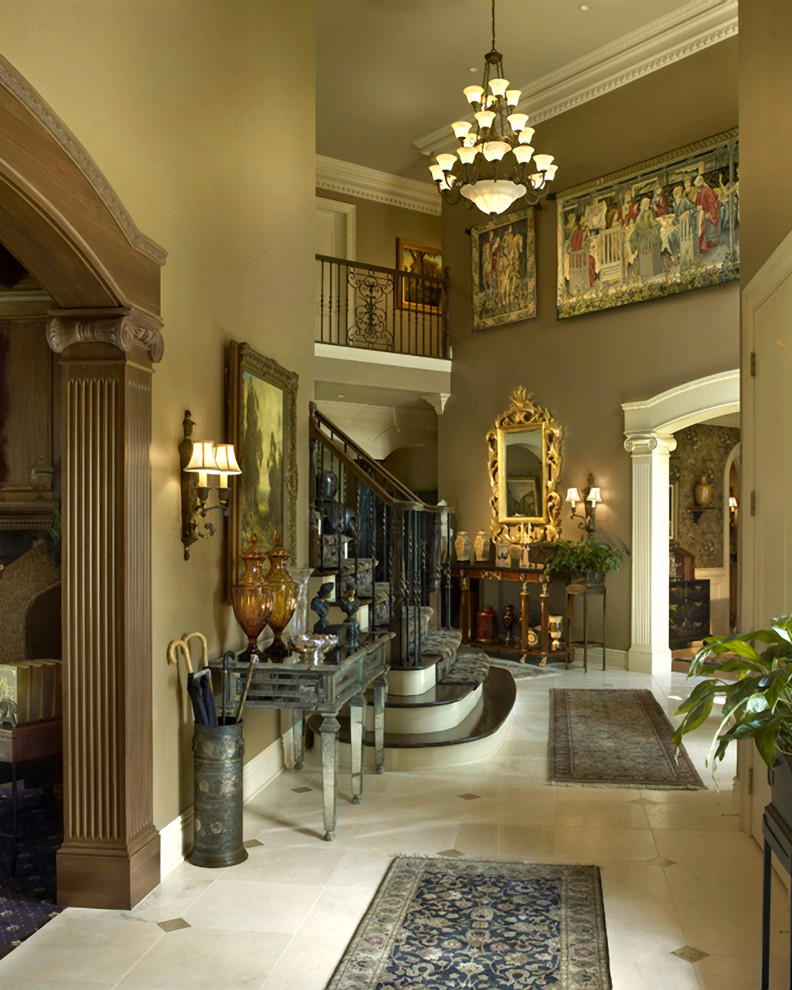 Inspiration for a large timeless limestone floor foyer remodel in Cleveland with beige walls