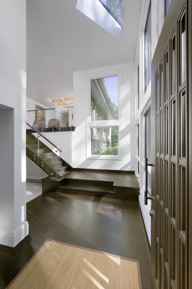 This is an example of a contemporary foyer in Boston with a single front door.