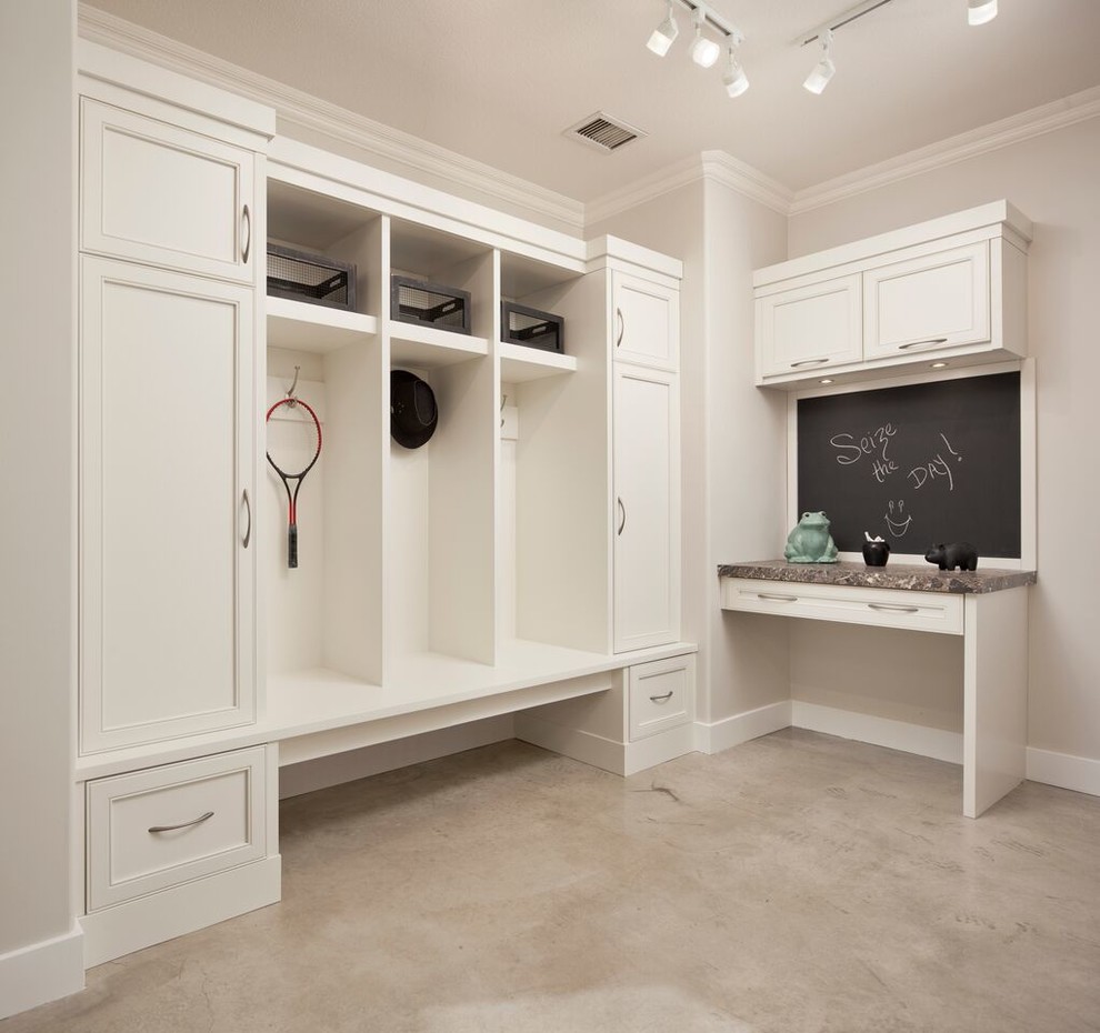 Medium sized traditional boot room in Toronto with grey walls, concrete flooring, a white front door and beige floors.