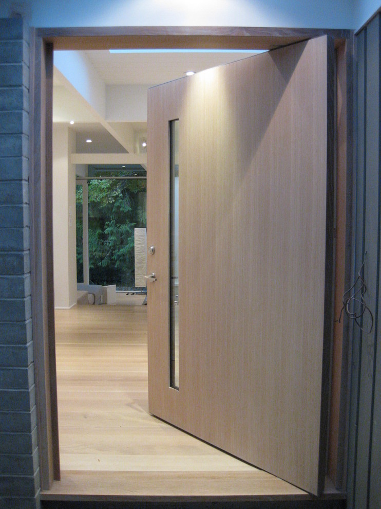Example of a trendy entryway design in Vancouver