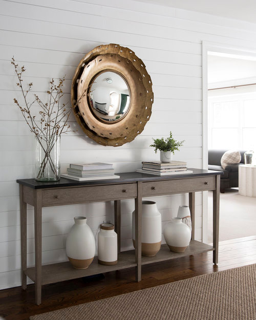 Foyer - mid-sized contemporary medium tone wood floor and brown floor foyer idea in Philadelphia with white walls