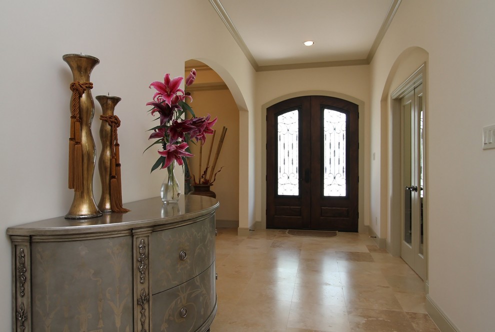 Inspiration for a mediterranean entryway remodel in Houston