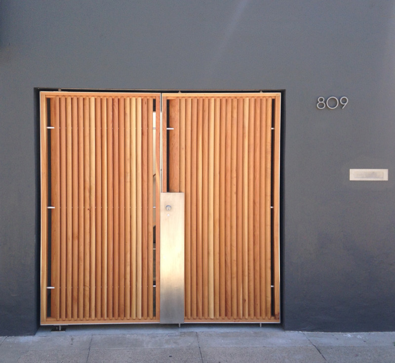 This is an example of a large modern front door in San Francisco with a double front door and a metal front door.