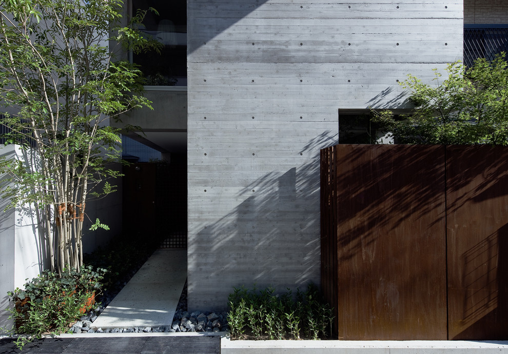 Inspiration for a contemporary entryway remodel in Osaka
