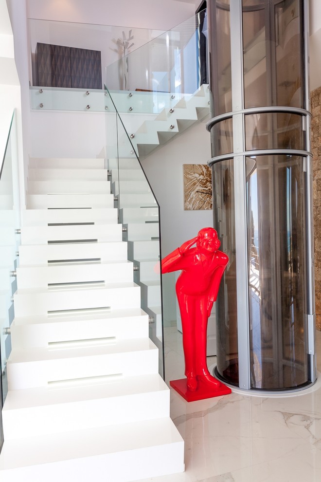 Example of a mid-sized trendy acrylic l-shaped staircase design in Alicante-Costa Blanca