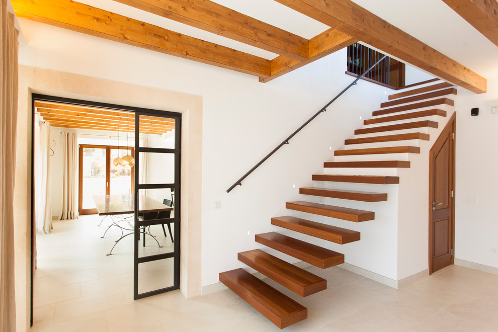 Idéer för att renovera en mellanstor minimalistisk rak trappa i trä, med öppna sättsteg