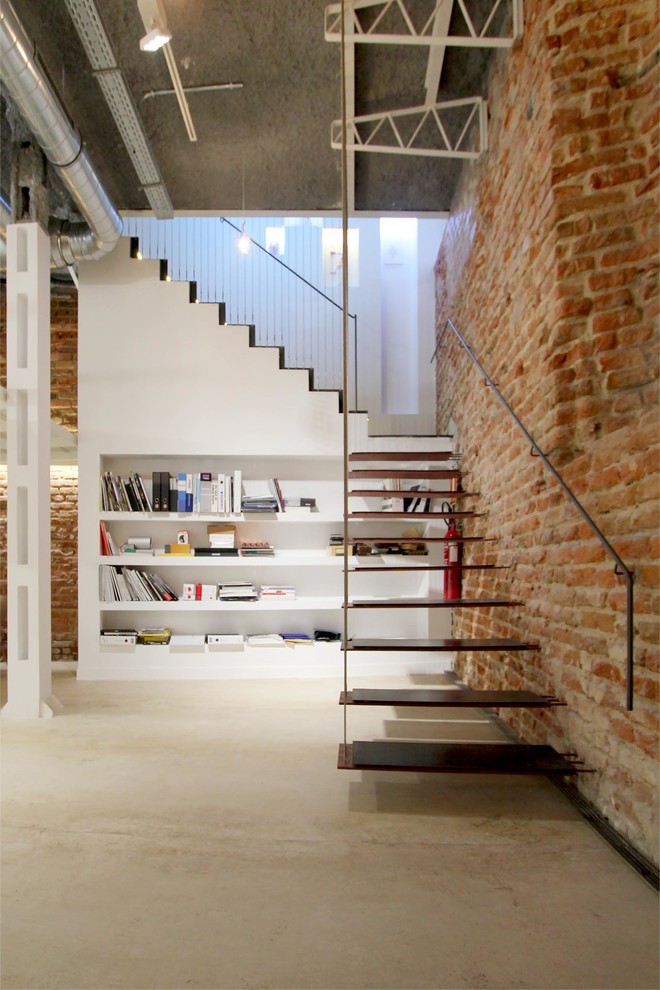Идея дизайна: угловая лестница среднего размера в стиле лофт без подступенок