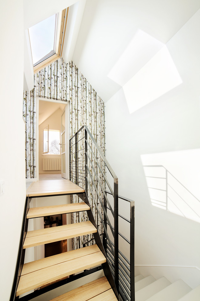 Idées déco pour un escalier sans contremarche flottant scandinave de taille moyenne avec des marches en bois.