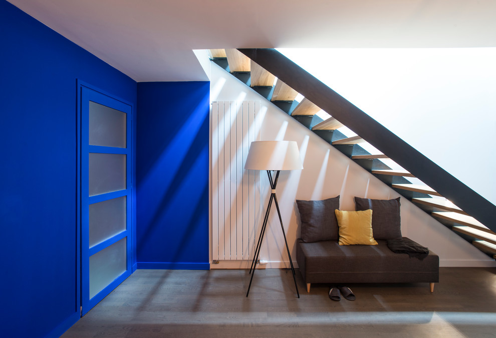 Large trendy wooden straight open staircase photo in Grenoble