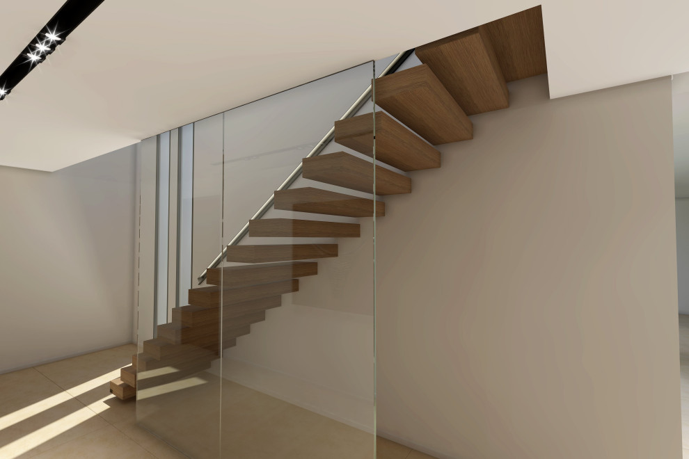 Inspiration pour un escalier design avec des marches en bois et un garde-corps en verre.