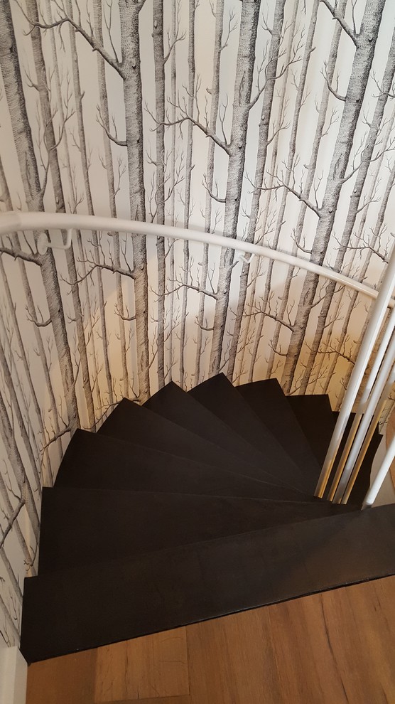 Inspiration pour un escalier sans contremarche courbe design en béton.