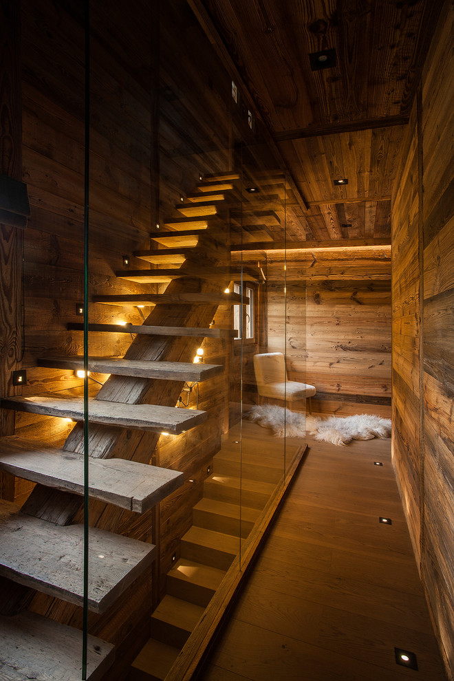 Diseño de escalera recta rural con escalones de madera