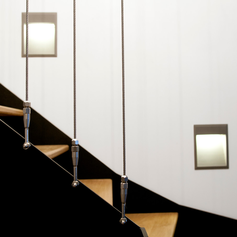 Idées déco pour un escalier contemporain avec éclairage.