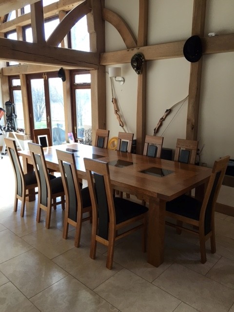 Dining room - rustic dining room idea in Sussex