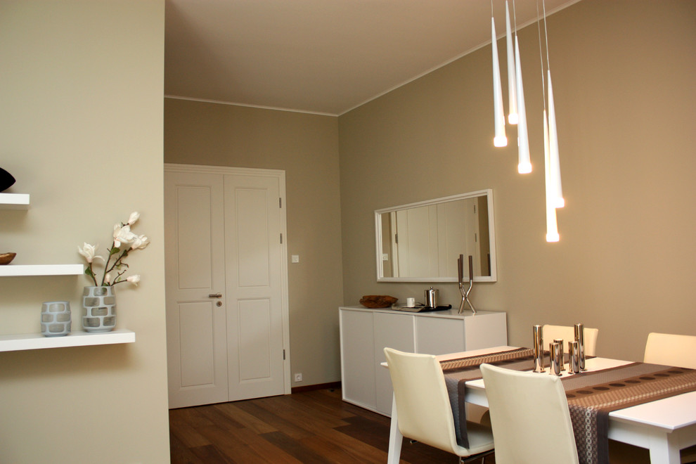 Photo of a contemporary dining room in Hanover with beige walls.