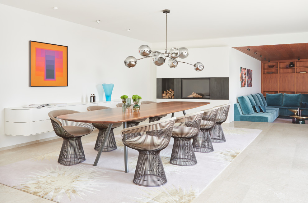 Ispirazione per una sala da pranzo aperta verso il soggiorno minimal con pareti bianche e pavimento beige
