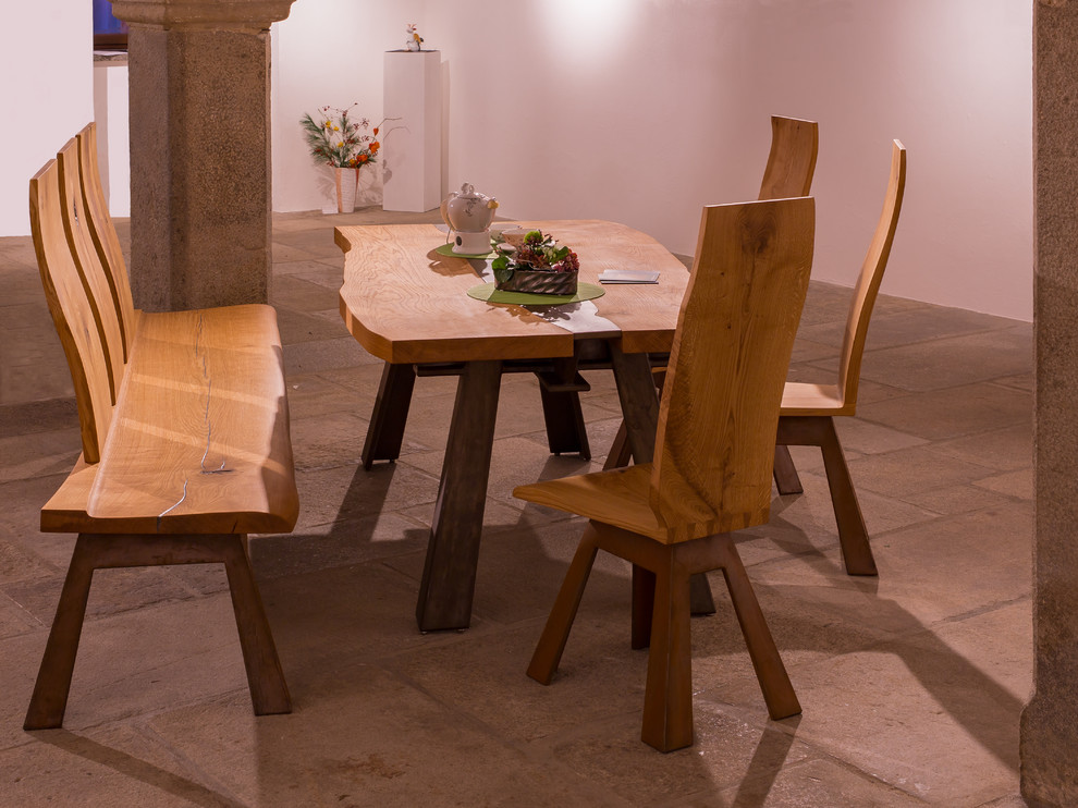 Foto de comedor actual, extra grande, abierto, con paredes blancas y suelo gris