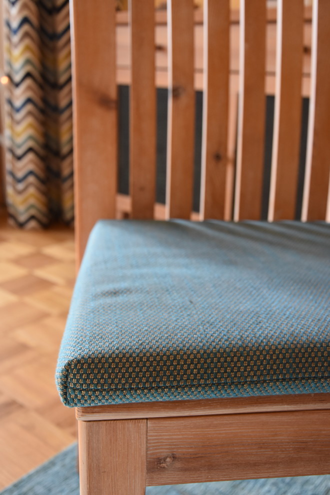 Beach style carpeted and blue floor dining room photo in Nuremberg with yellow walls