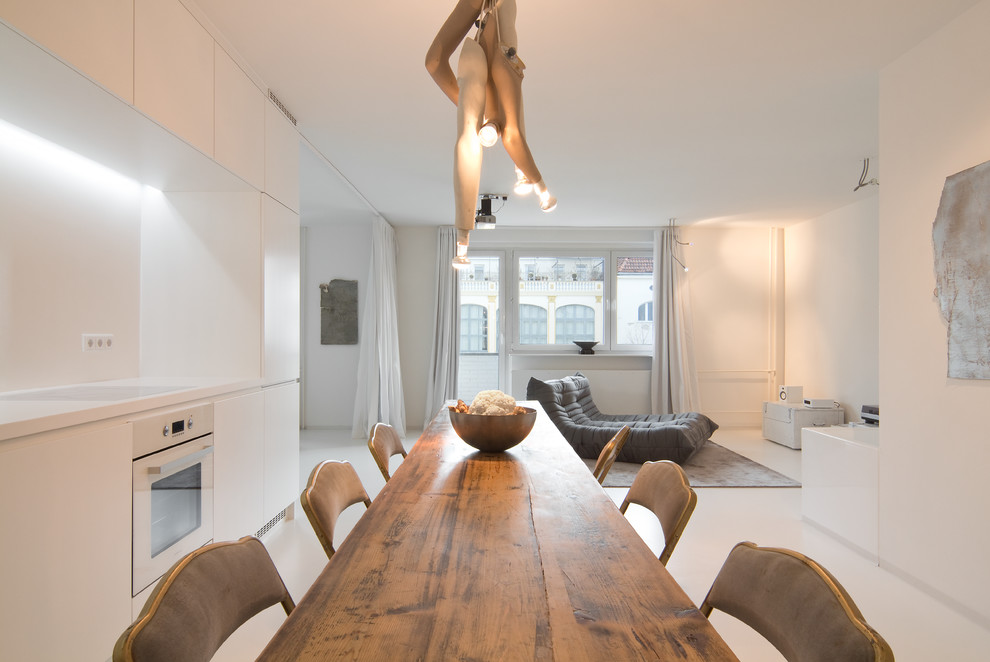 Example of a large trendy great room design in Berlin with white walls