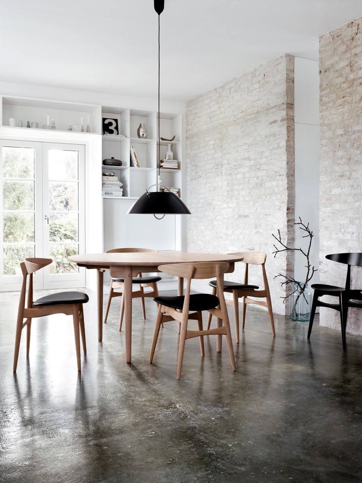 This is an example of a contemporary dining room in Cologne.