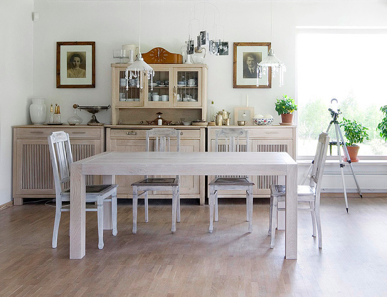 Example of a trendy dining room design in Other with white walls