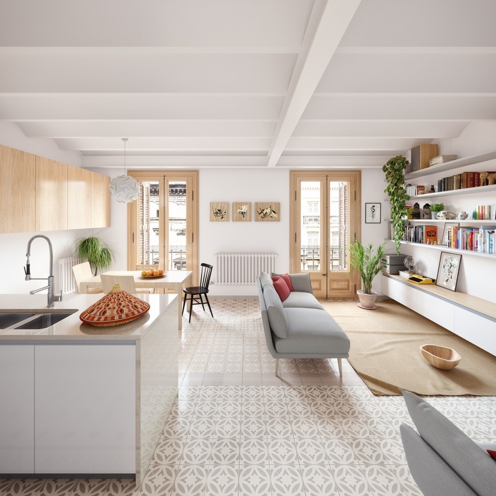 Ispirazione per una sala da pranzo aperta verso il soggiorno design con pareti bianche e pavimento grigio