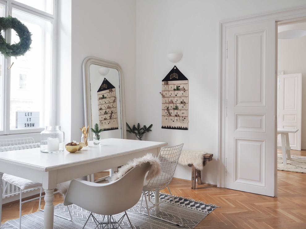 Example of a danish dining room design in Other