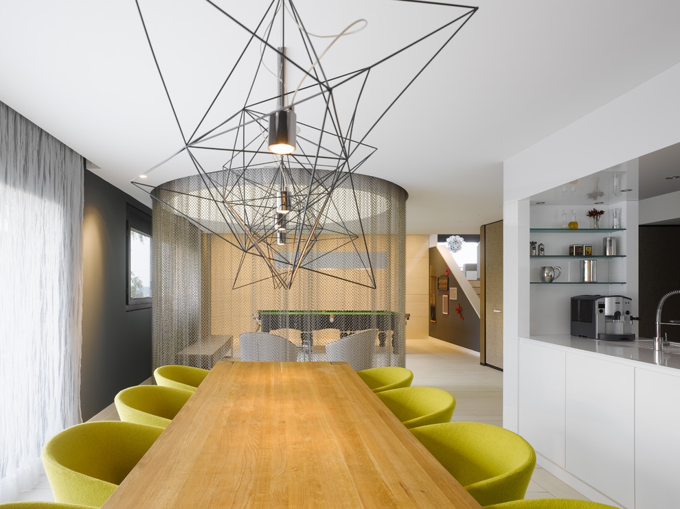 Idee per una grande sala da pranzo aperta verso il soggiorno design