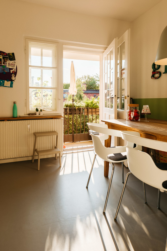 Idee per una piccola sala da pranzo aperta verso la cucina contemporanea con pareti bianche, nessun camino e pavimento beige