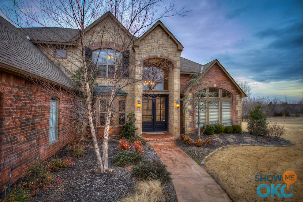 Design ideas for a traditional house exterior in Oklahoma City.
