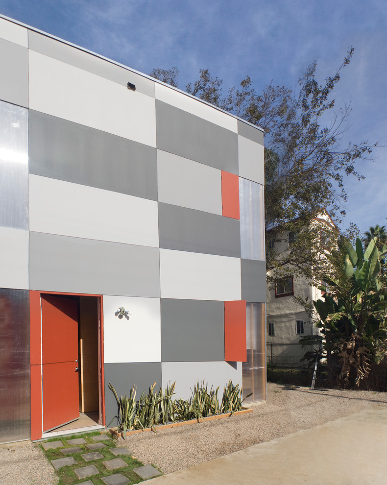 Example of a trendy gray exterior home design in Melbourne