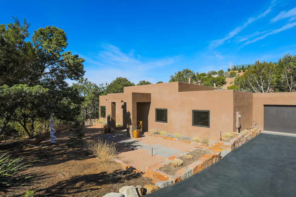 Design ideas for a contemporary house exterior in Albuquerque.