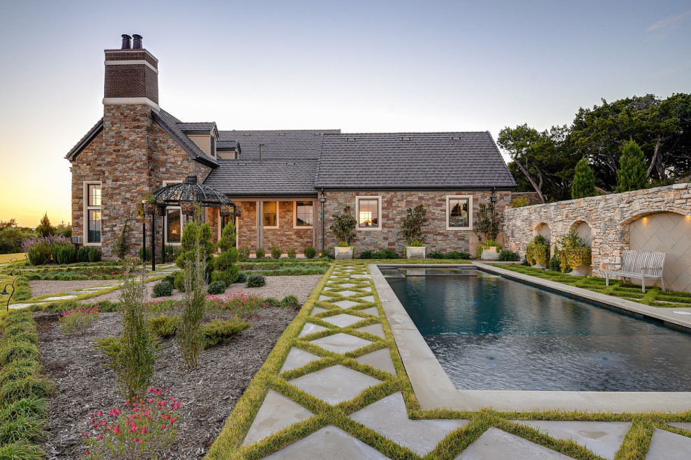 Inspiration for a french country exterior home remodel in Austin