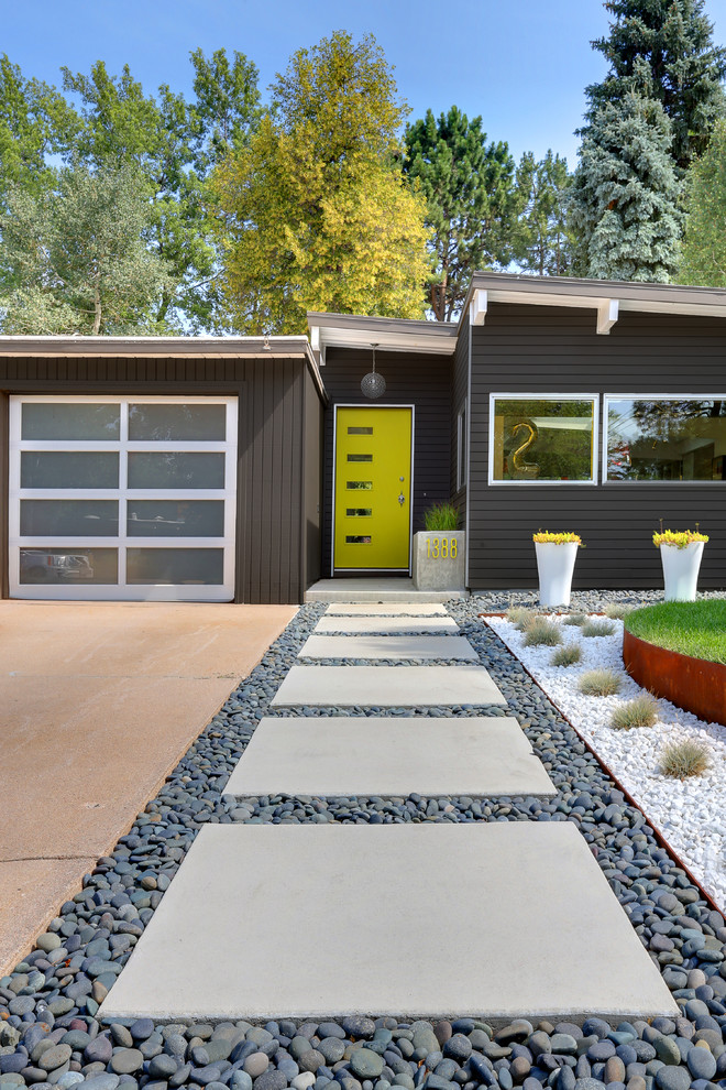 Mid-century modern gray one-story exterior home photo in Denver