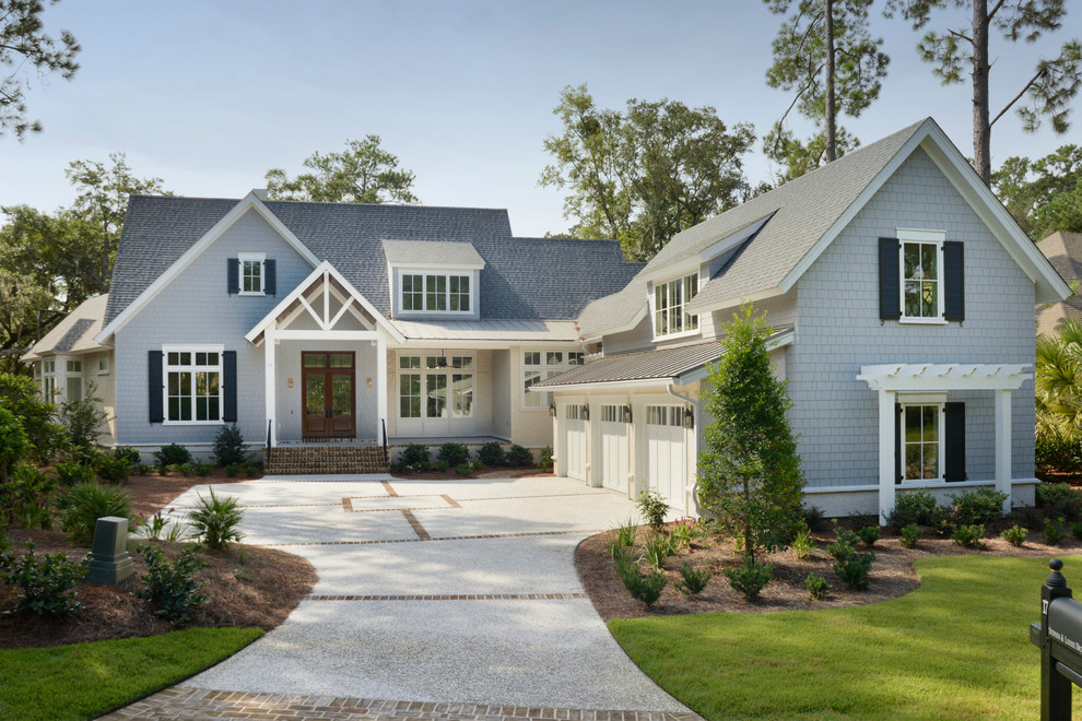 Large traditional gray two-story wood gable roof idea in Atlanta