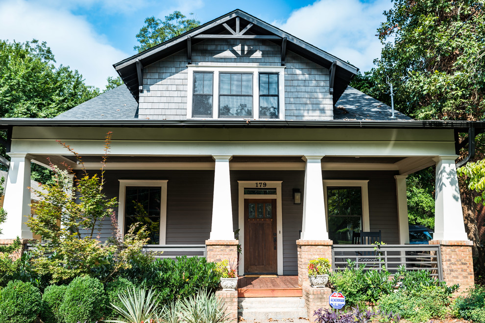 Inspiration for a large craftsman gray two-story concrete fiberboard gable roof remodel in Atlanta