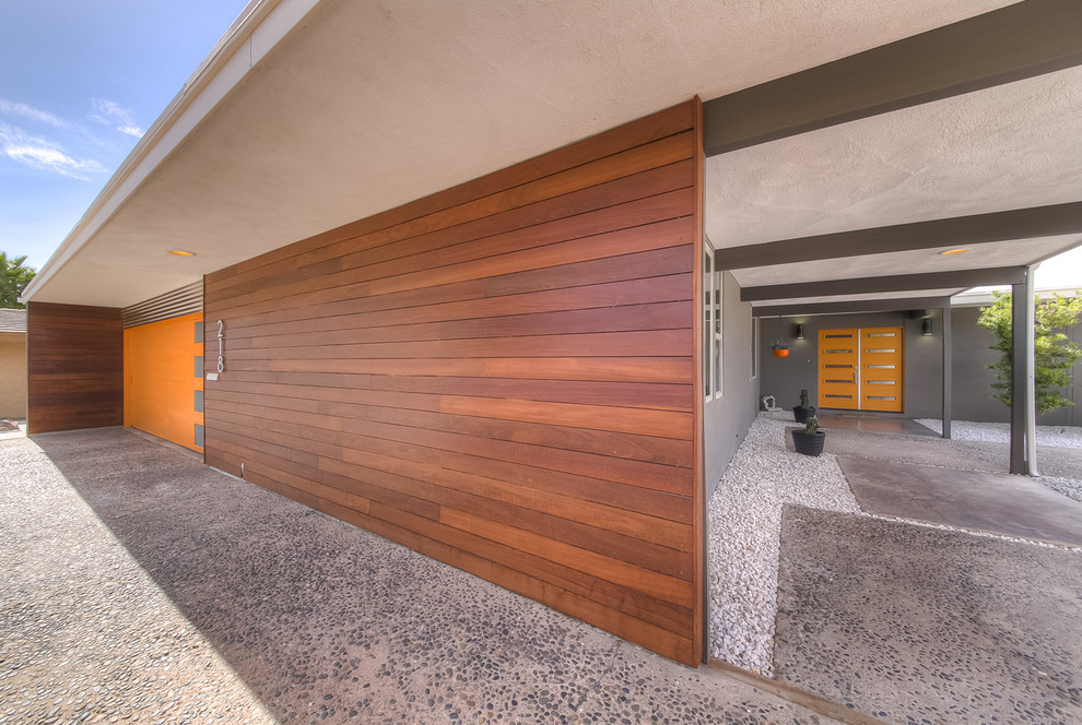 Inspiration for a 1960s gray one-story house exterior remodel in Las Vegas