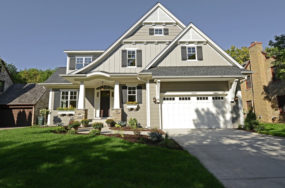 Traditional gray two-story exterior home idea in Minneapolis