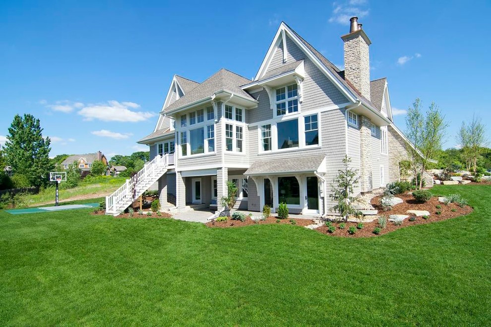Inspiration for a large timeless exterior home remodel in Minneapolis