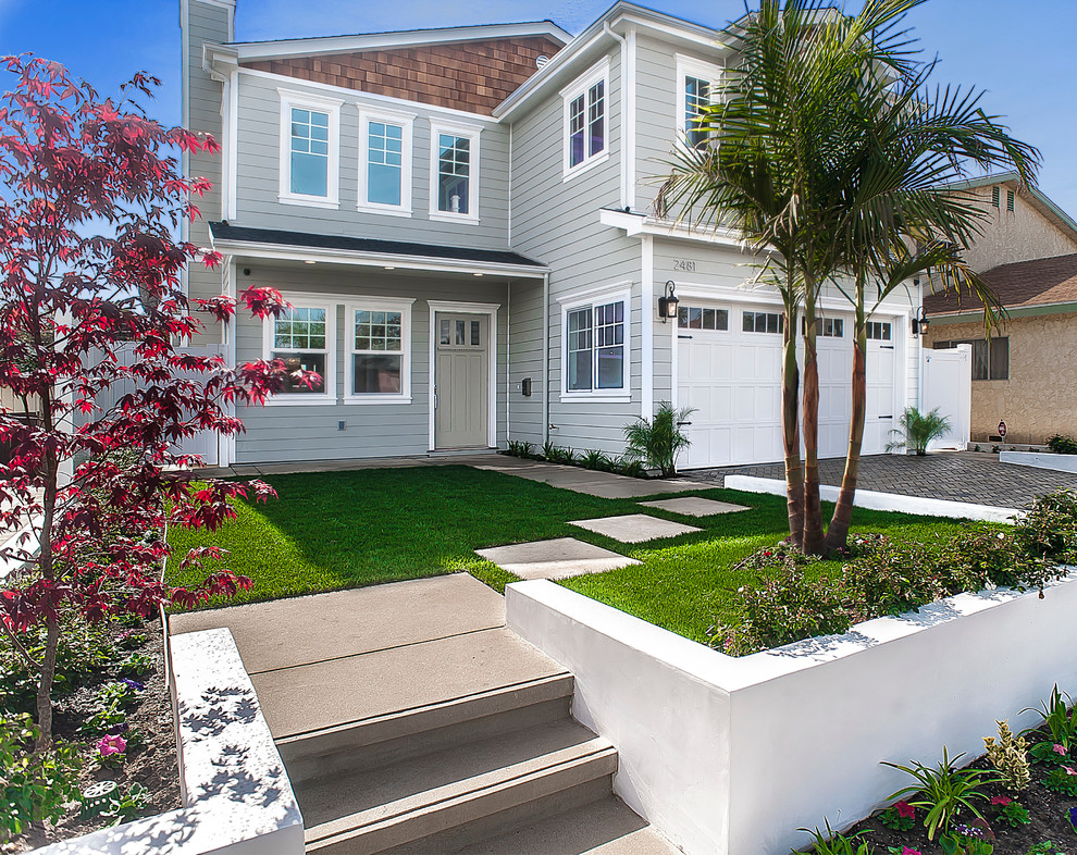 Design ideas for a gey traditional two floor house exterior in Los Angeles.
