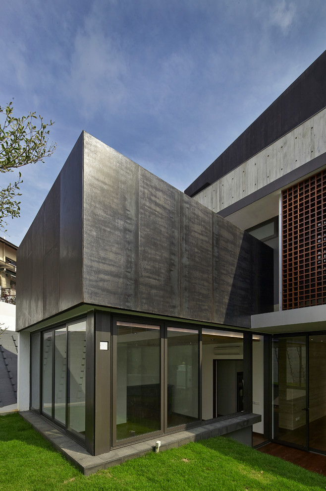 Idee per la facciata di una casa contemporanea a tre piani