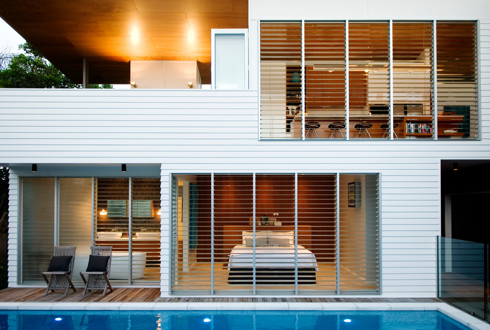 White contemporary two floor house exterior in Sunshine Coast.