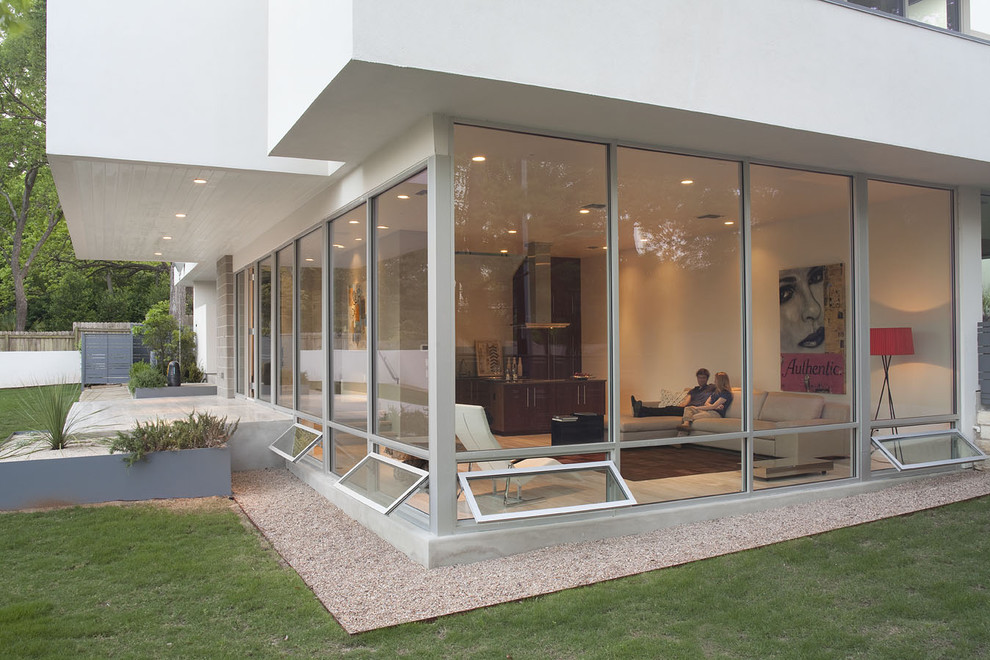 Example of a minimalist two-story exterior home design in Austin