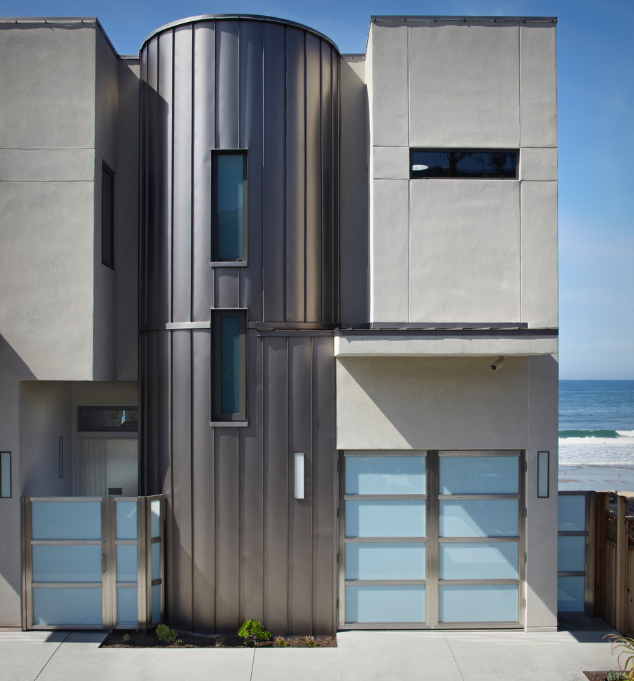 Design ideas for a contemporary house exterior in Santa Barbara with metal cladding.