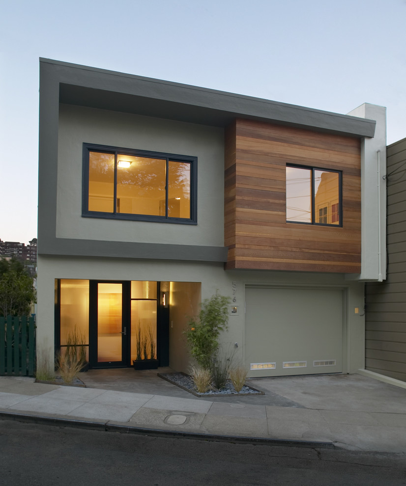 Inspiration for a medium sized and multi-coloured contemporary two floor detached house in San Francisco with mixed cladding and a flat roof.